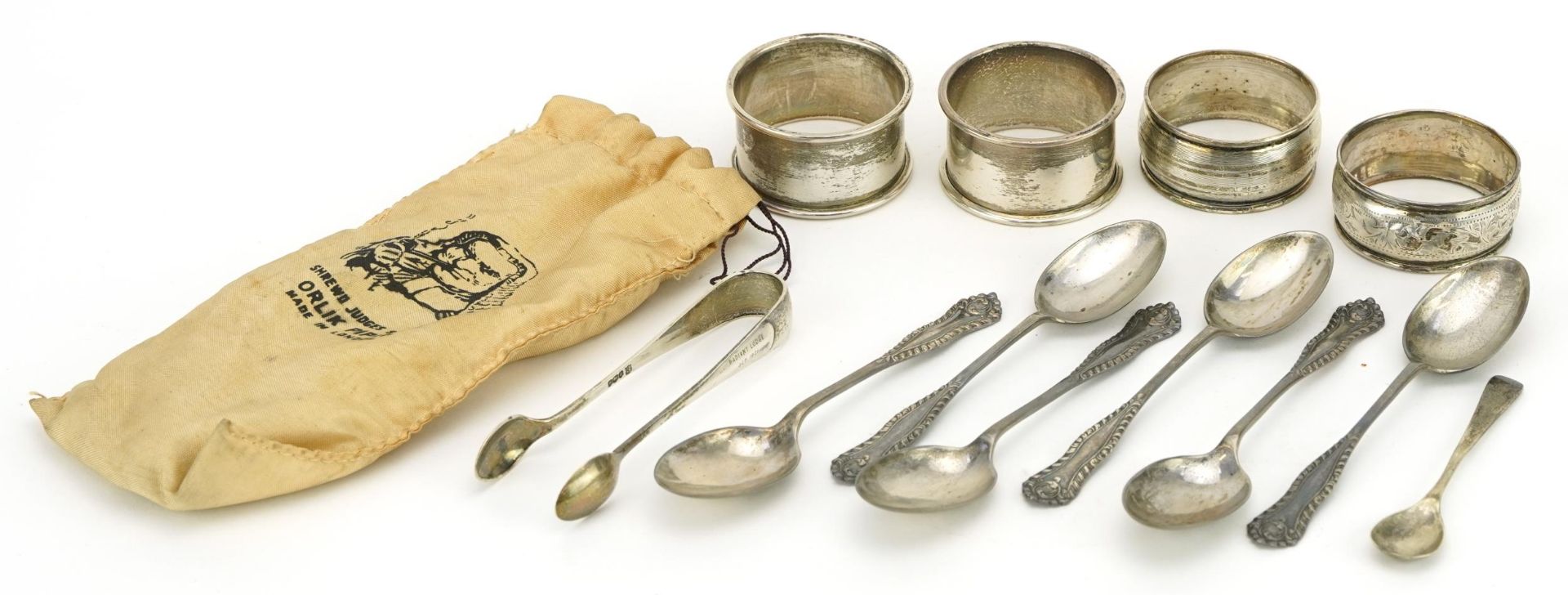 Edwardian and later silver comprising set of six teaspoons, four napkin rings, sugar tongs and
