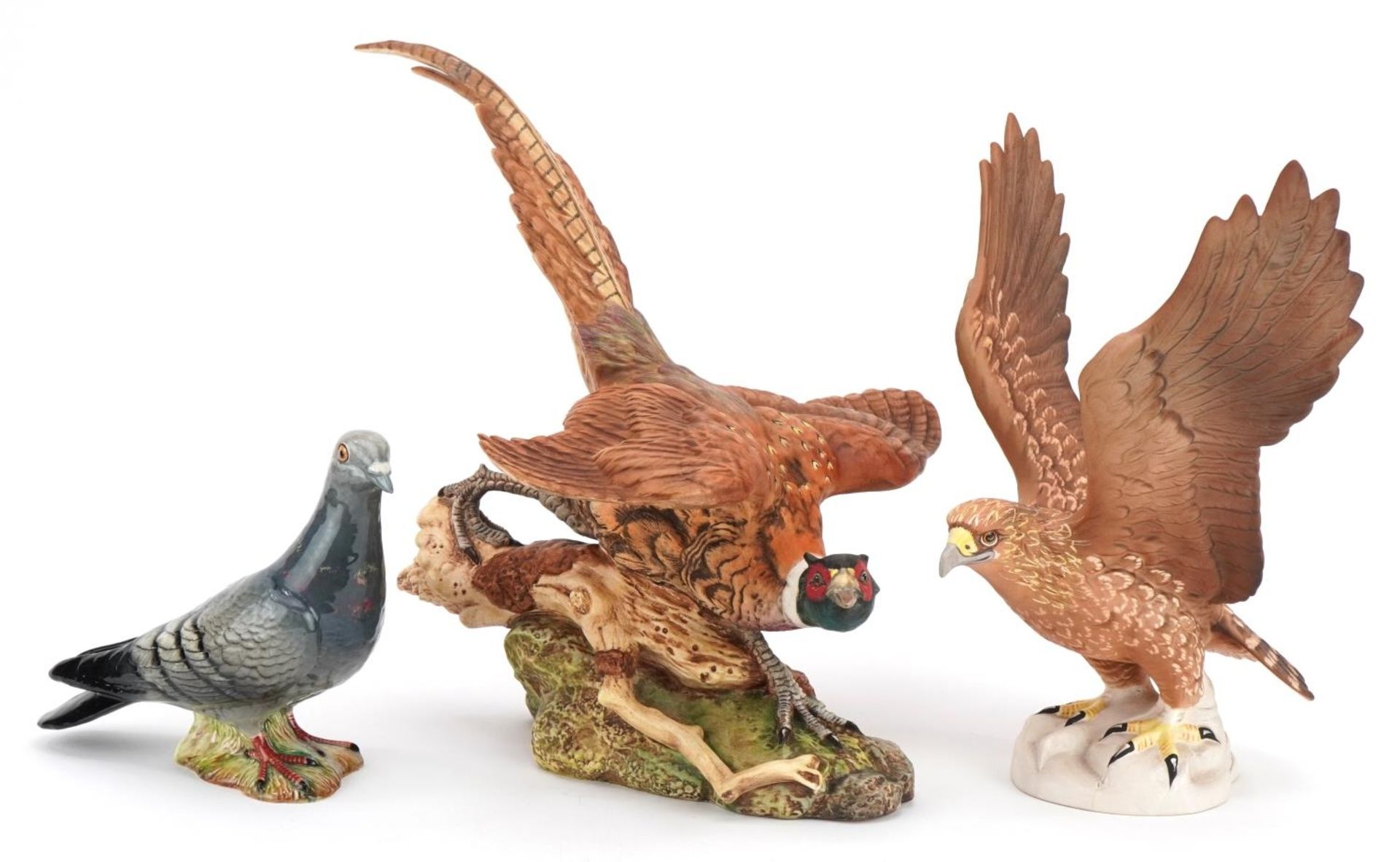 Three Beswick birds, two with matt glaze comprising pheasant, golden eagle and pigeon numbered 1383,