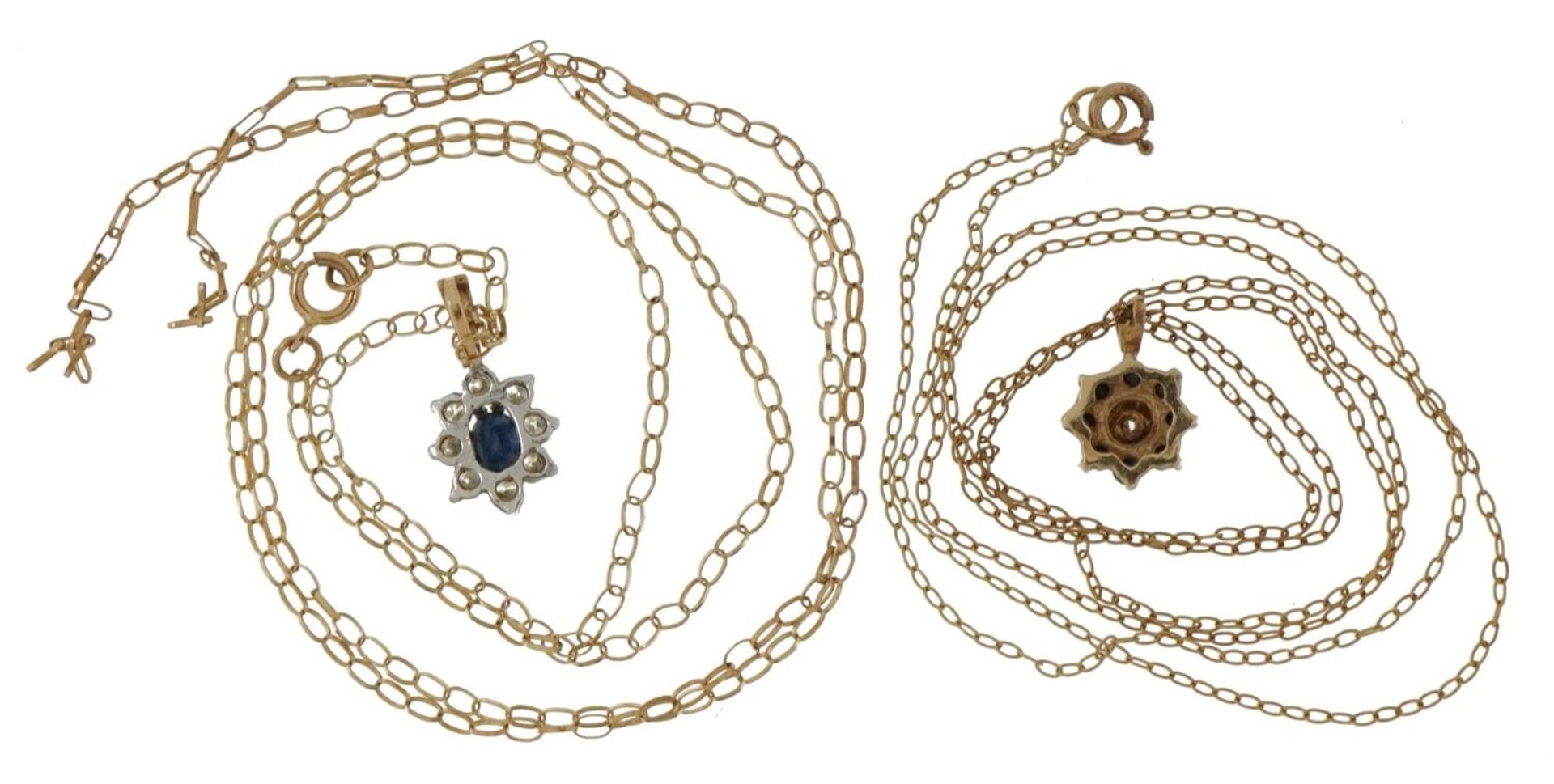 Two unmarked gold sapphire cluster pendants, one set with a diamond, on 9ct gold necklaces, the - Bild 3 aus 3