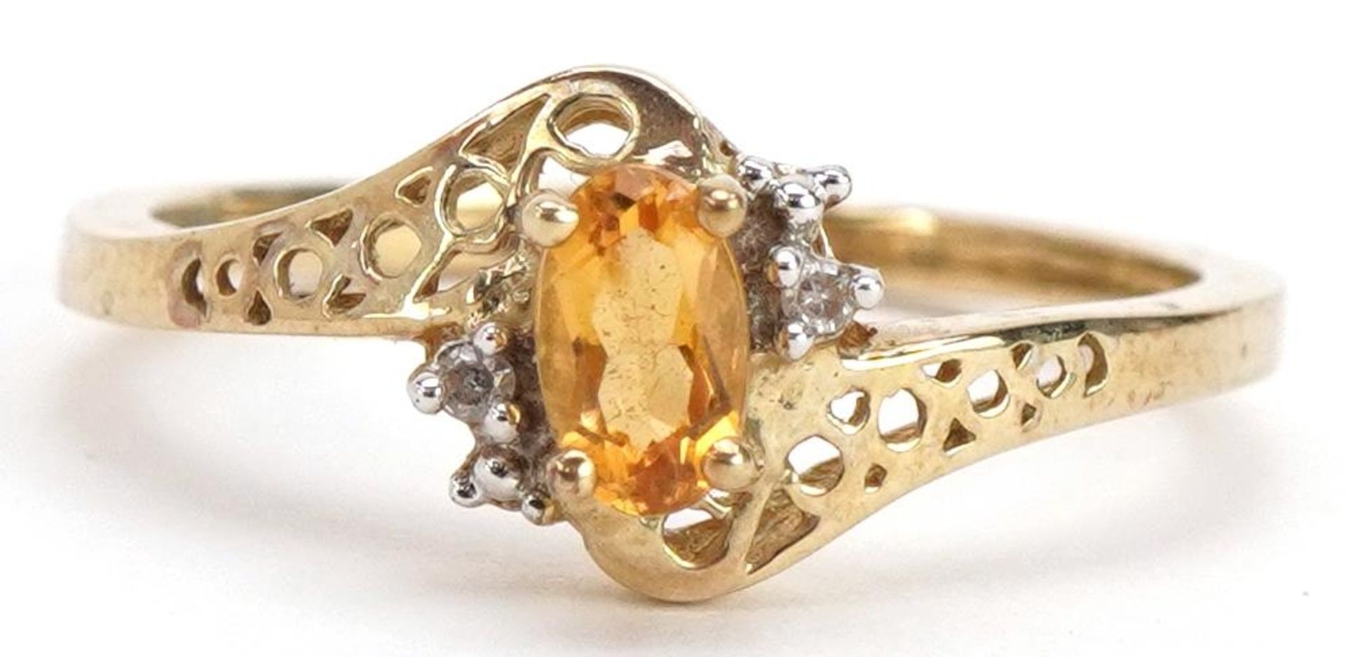 9ct gold citrine and diamond crossover ring with pierced shoulders, size L, 1.5g