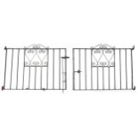 Pair of black painted wrought iron garden gates, 91cm high x approximately 250cm wide