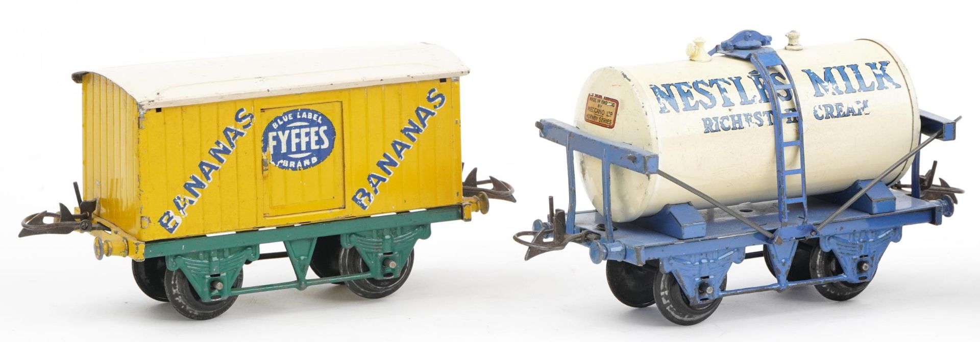 Four Hornby O gauge tinplate model railway advertising wagons comprising Nestle Milk, United Dairies - Image 2 of 5