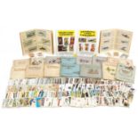 Collection of cigarette cards, some booklets including football and RAF badges