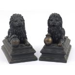 Large pair of bronzed recumbent lions, 25cm in length