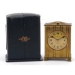 Zenith, Art Deco brass cased travel alarm clock with velvet lined case, the clock retailed by Arnold