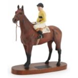 Beswick Connoisseur model of Pat Taaffe on Arkle raised on a hardwood plinth base, 28cm in length