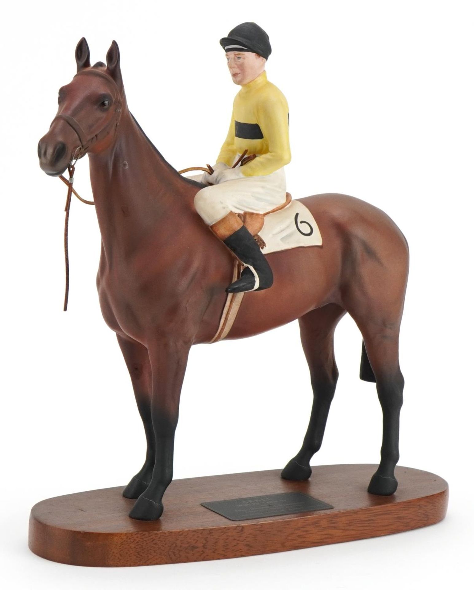 Beswick Connoisseur model of Pat Taaffe on Arkle raised on a hardwood plinth base, 28cm in length