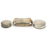 Two circular silver pillboxes and a silver snuff box, the largest 6.5cm wide, total 58.2g