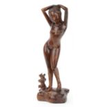Thai tribal interest rosewood carving of a standing nude female, 52.5cm high