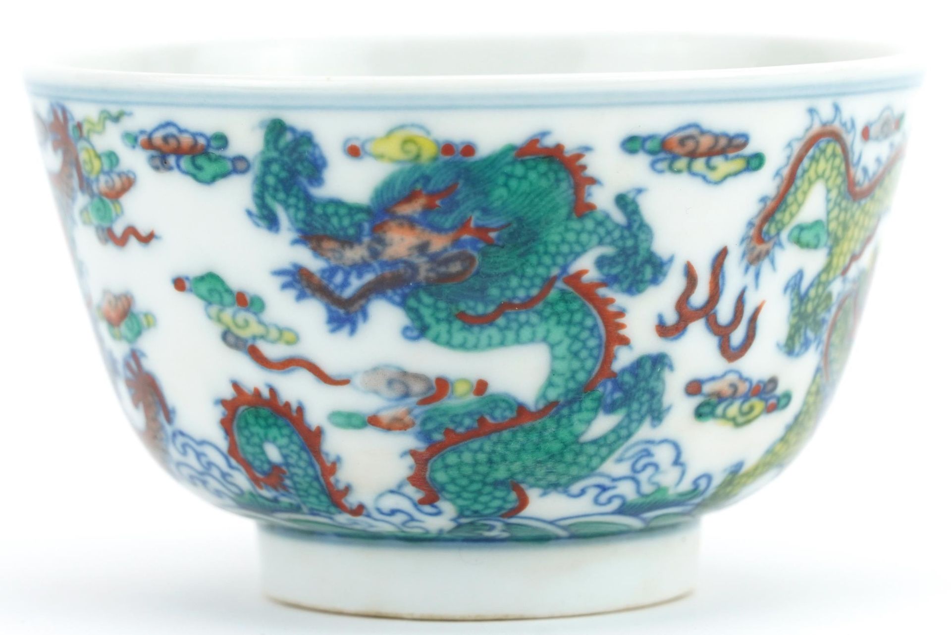 Chinese doucai porcelain bowl hand painted with dragons amongst clouds, six figure character marks