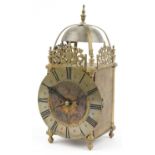 18th century style brass lantern clock with twin fusee movement and circular chapter ring having