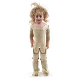 Antique bisque headed and leather fashion doll with open close eyes and articulated limbs,