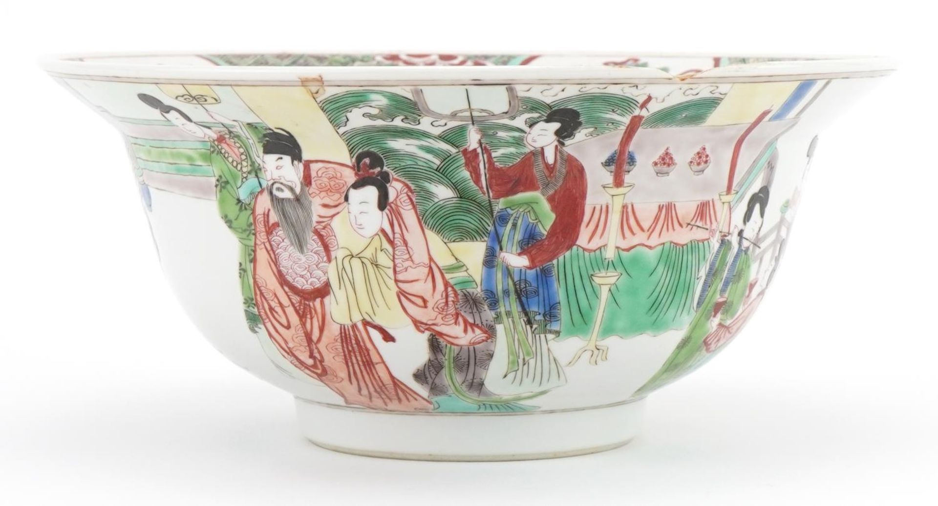 Chinese bowl hand painted in the famille verte palette with figures in a palace setting, Kangxi leaf