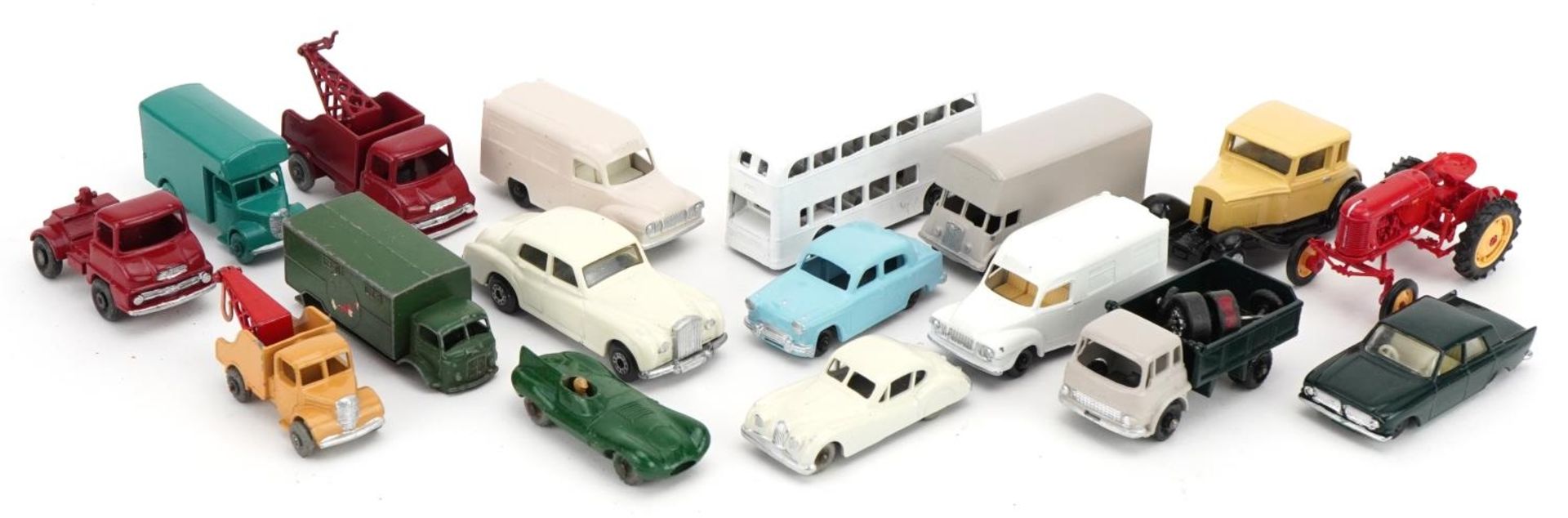 Lesney diecast vehicles including D Type Jaguar and Lomas ambulance