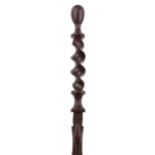 Tribal interest hardwood walking stick carved with a serpent, 93cm in length