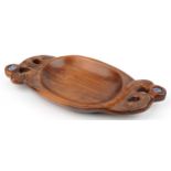 New Zealand Maori carved wood twin handled bowl with inset abalone panels, 42cm wide