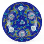 Turkish Ottoman Iznik plate hand painted with stylised flowers, 36cm in diameter