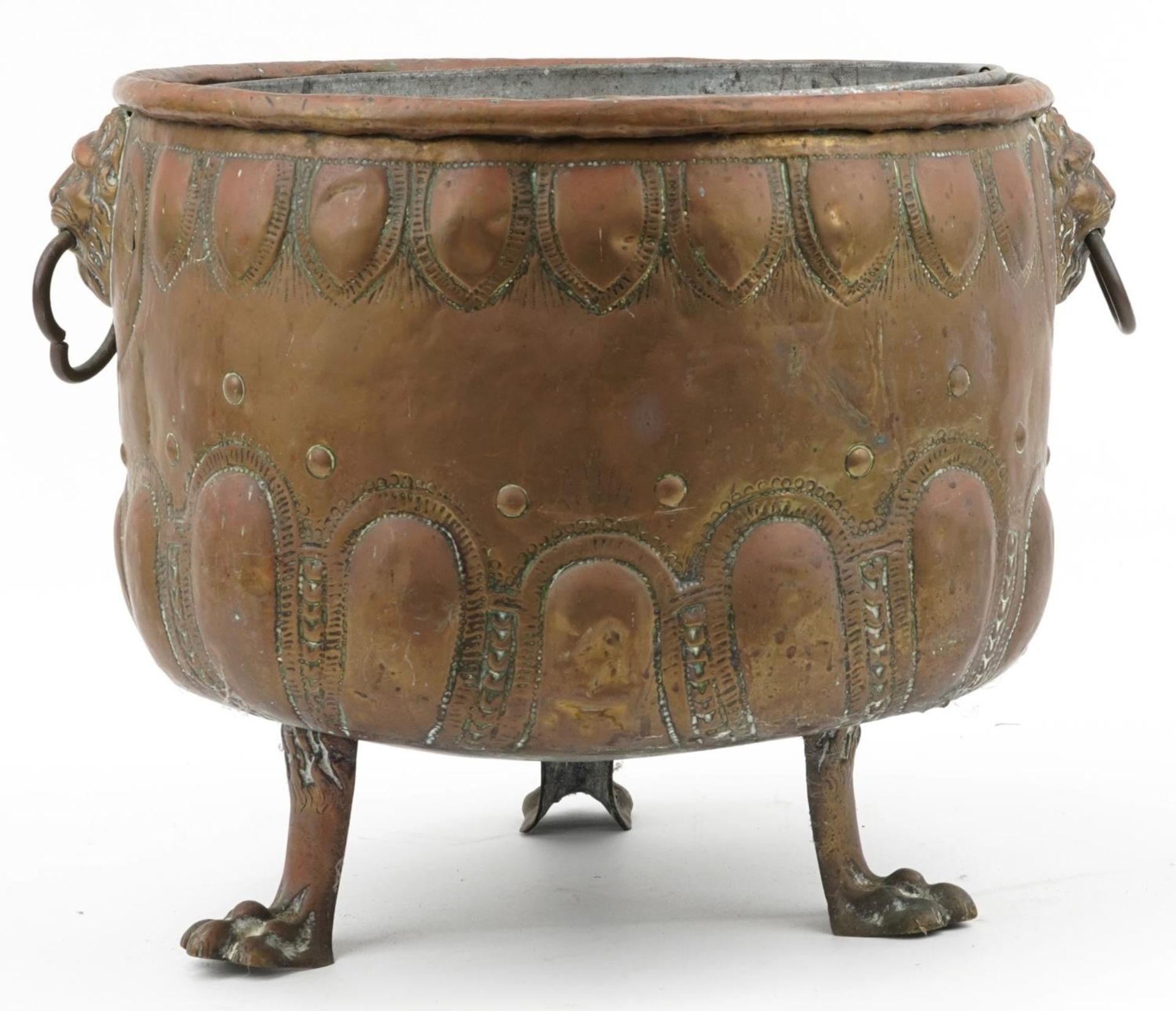 Large Victorian copper coal bucket with lion mask ring handles and raised on three lion paw feet, - Image 2 of 4