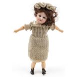 Armand Marseille, antique German bisque headed doll with open close eyes and articulated limbs,