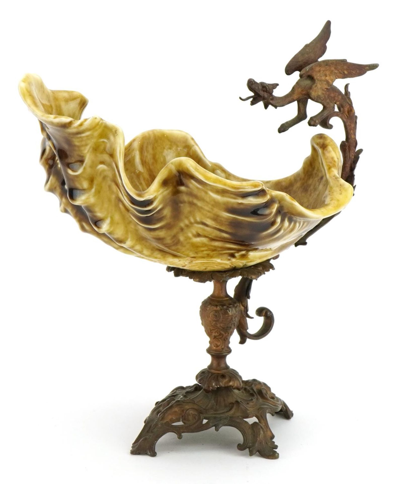 19th century continental gilt metal centrepiece with dragon handle and pottery shell shaped bowl,