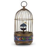Brass and cloisonne clockwork automaton bird cage with alarm clock, 19.5cm high