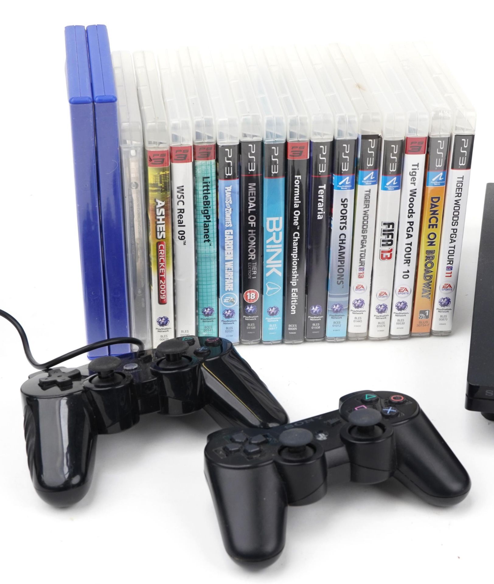 Sony PlayStation 3 games console with controllers and collection of games - Image 2 of 4