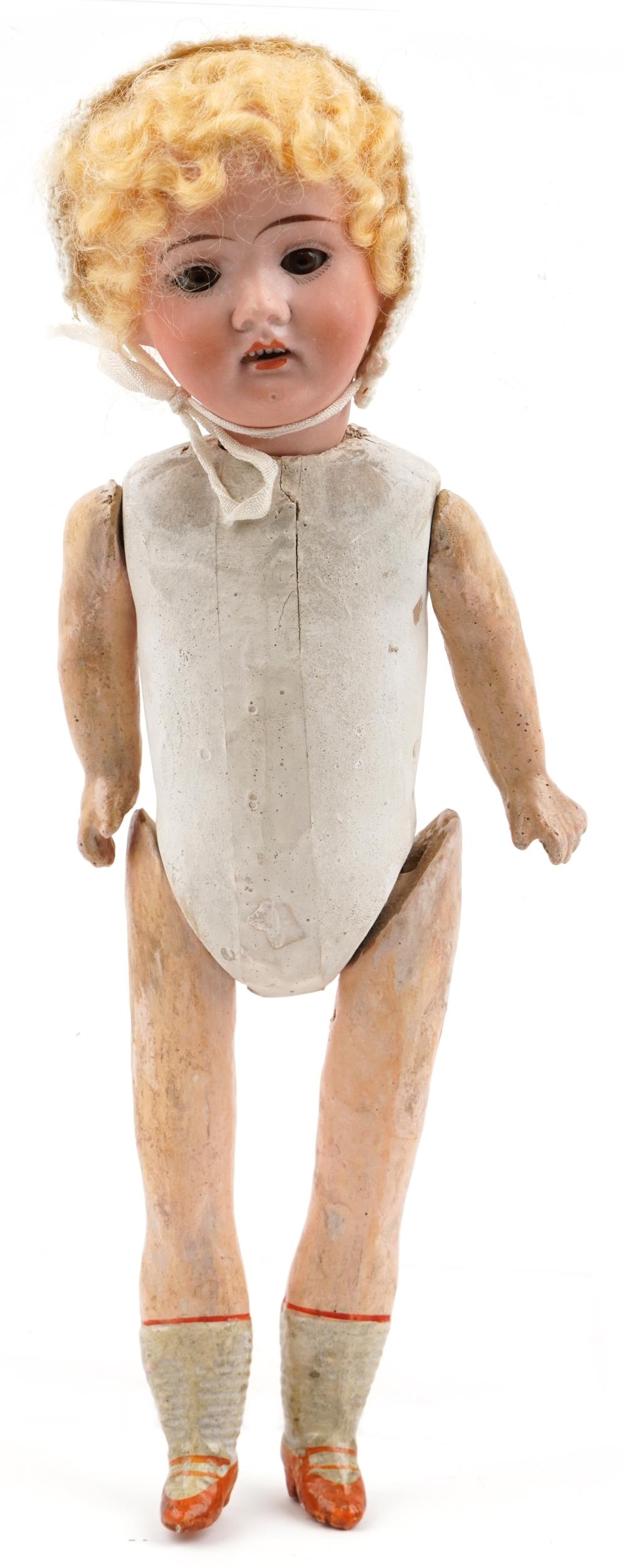 Antique German bisque headed doll with open close eyes and jointed limbs, impressed 21 R 8/0 2 to