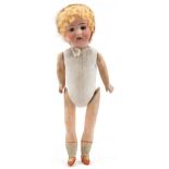 Antique German bisque headed doll with open close eyes and jointed limbs, impressed 21 R 8/0 2 to