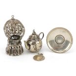 Doll's house silver teapot on stand and filigree birdcage, the largest 6.5cm high, total 50.0g