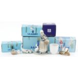 Four Lladro porcelain animals, figures and a bell with boxes, the largest 22cm high