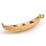 Gold rowing boat charm, indistinct marks, 2.7cm wide, 1.4g