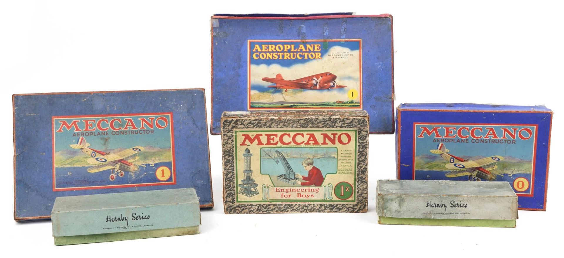 Collection of vintage Meccano and Hornby O gauge model railway boxes including Meccano 0, 1, 1X