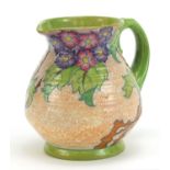 Charlotte Rhead for Crown Ducal, Art Deco pottery jug hand painted with flowers, 16cm high