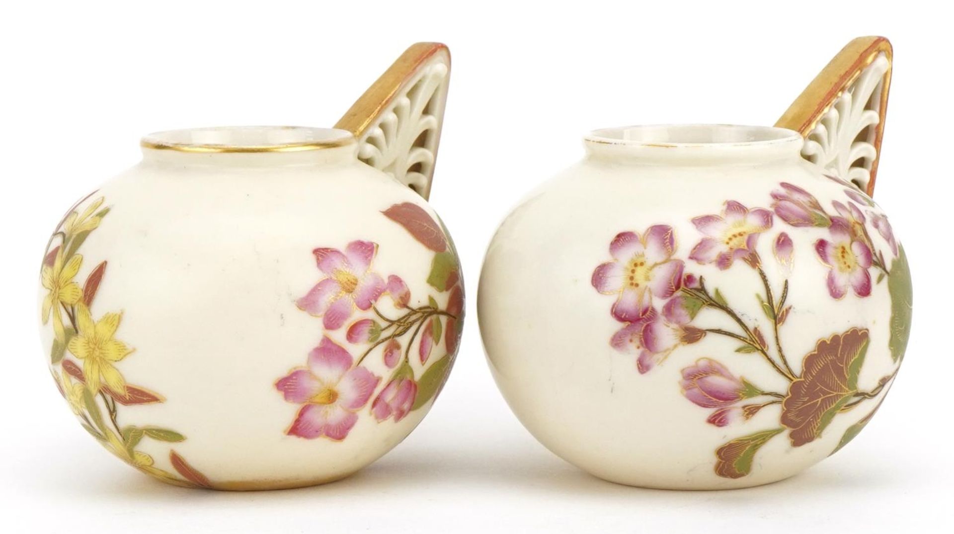 Royal Worcester, pair of Victorian blush ivory vases with pierced handles, each decorated with