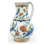 Turkish Ottoman Iznik pottery water jug, 24cm high