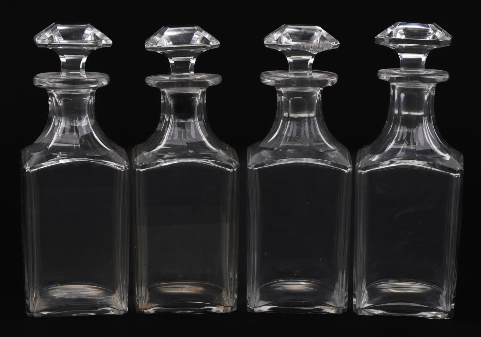 Set of four antique square glass decanters with stoppers, 20cm high
