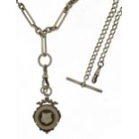Two watch chains with T bars include a silver example with Edwardian jewel, the largest 34cm in