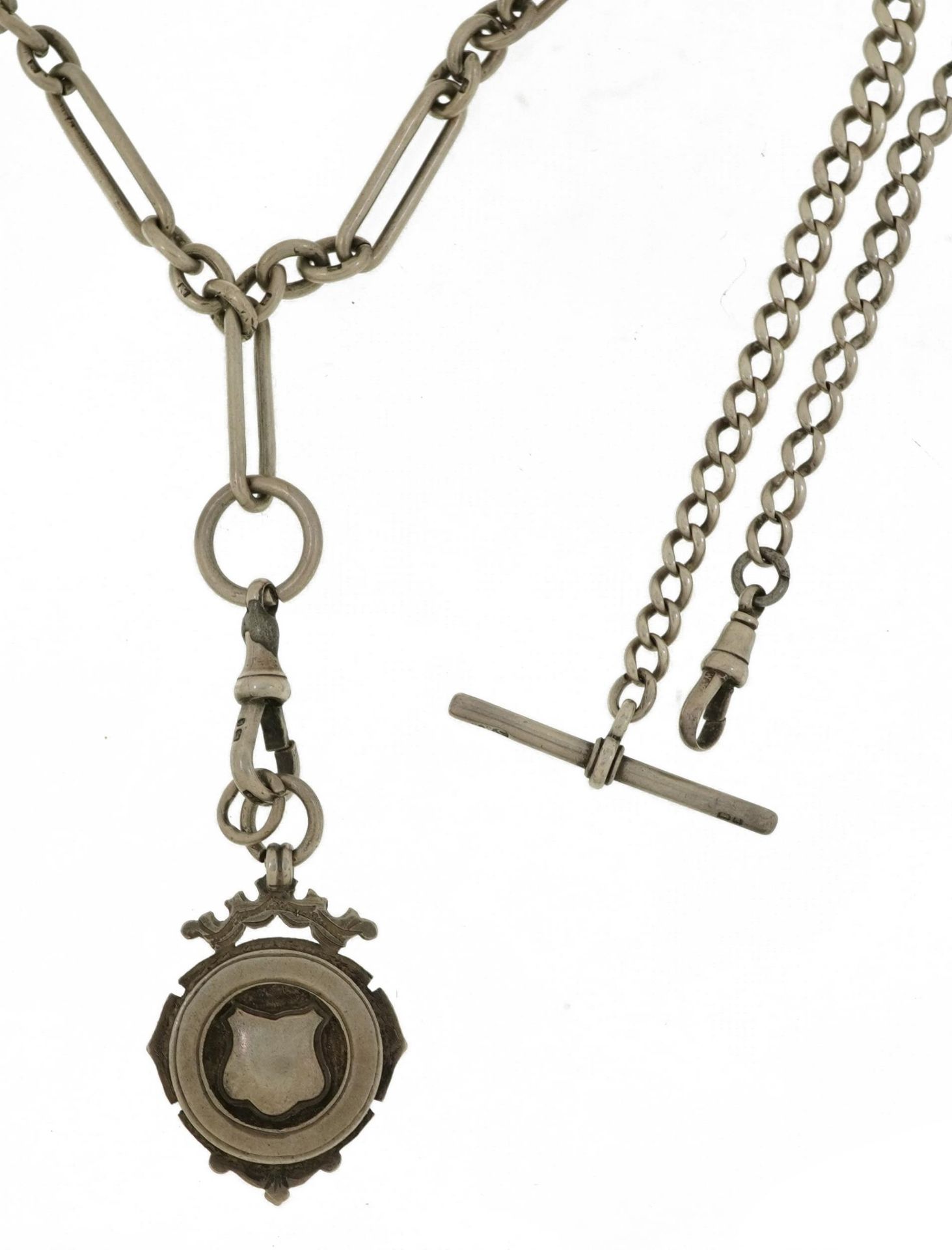 Two watch chains with T bars include a silver example with Edwardian jewel, the largest 34cm in