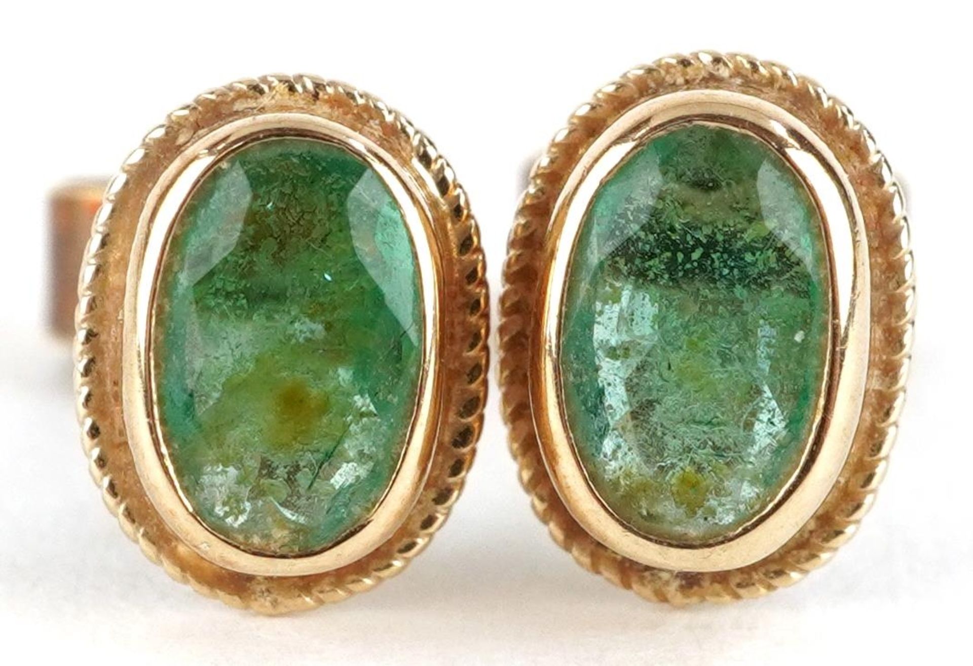 Pair of 9ct gold emerald stud earrings, 8mm high, 1.1g