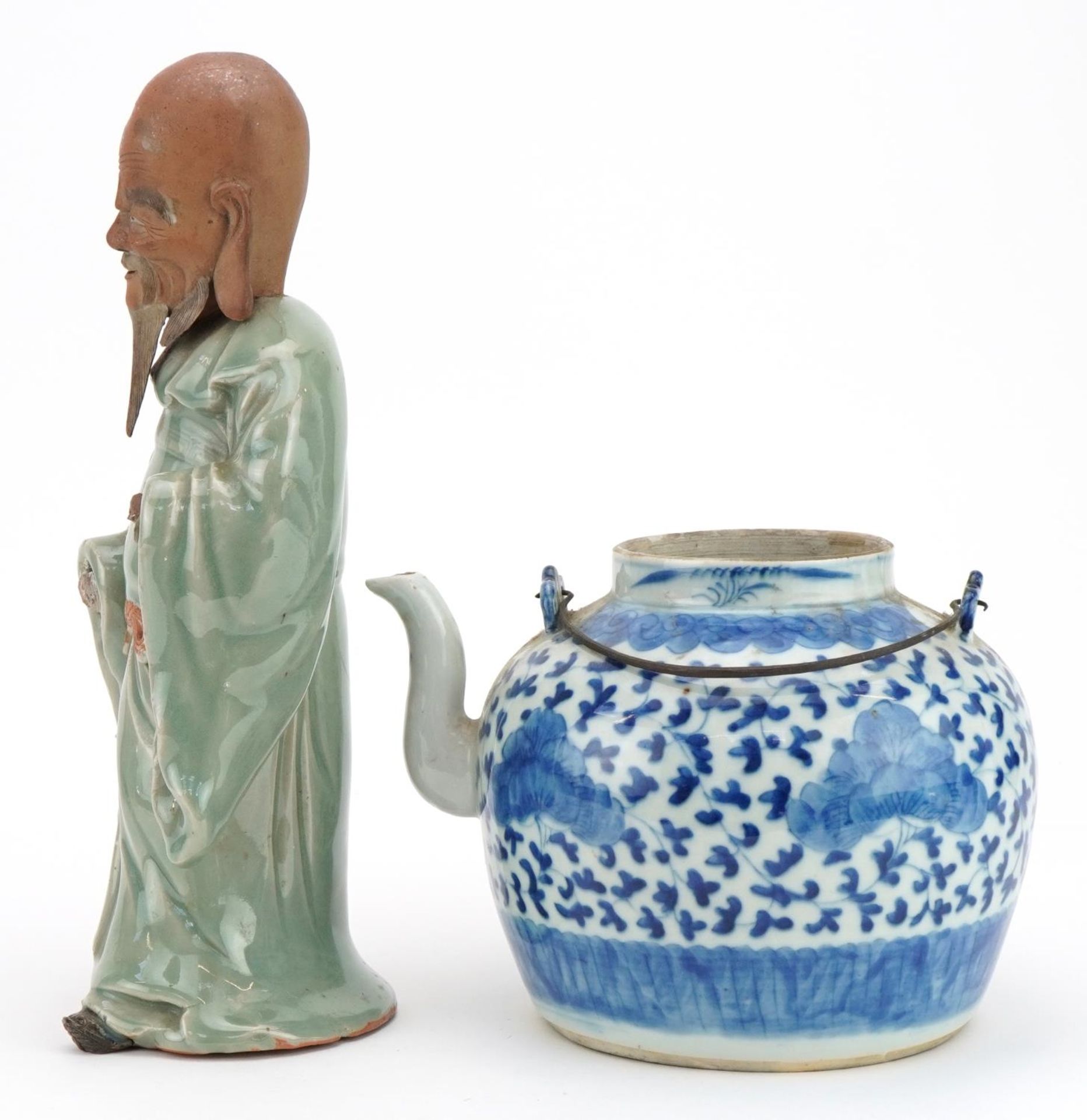 Chinese blue and white porcelain teapot and a celadon glazed figure, the largest 30cm high - Image 3 of 7