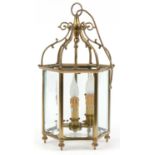 Good quality Gothic style brass hanging three branch lanterns with bevelled glass panels, 55.5cm