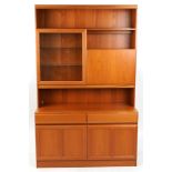 McIntosh, Mid century Scottish teak wall unit with glazed door and drinks cabinet above two