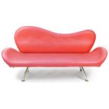 Red faux leather lips design salon settee raised on chrome legs, 180cm wide