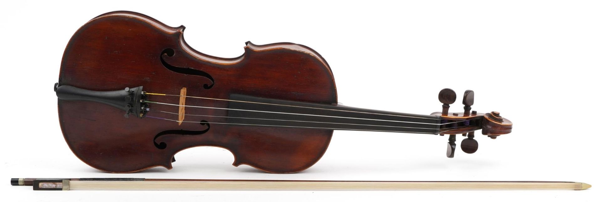 Old wooden violin with one piece back, the violin with rosewood mount and fitted carrying case,