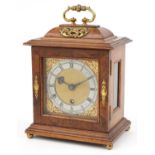 Victorian burr wood mantle clock with gilt metal mounts and silvered dial having Roman numerals