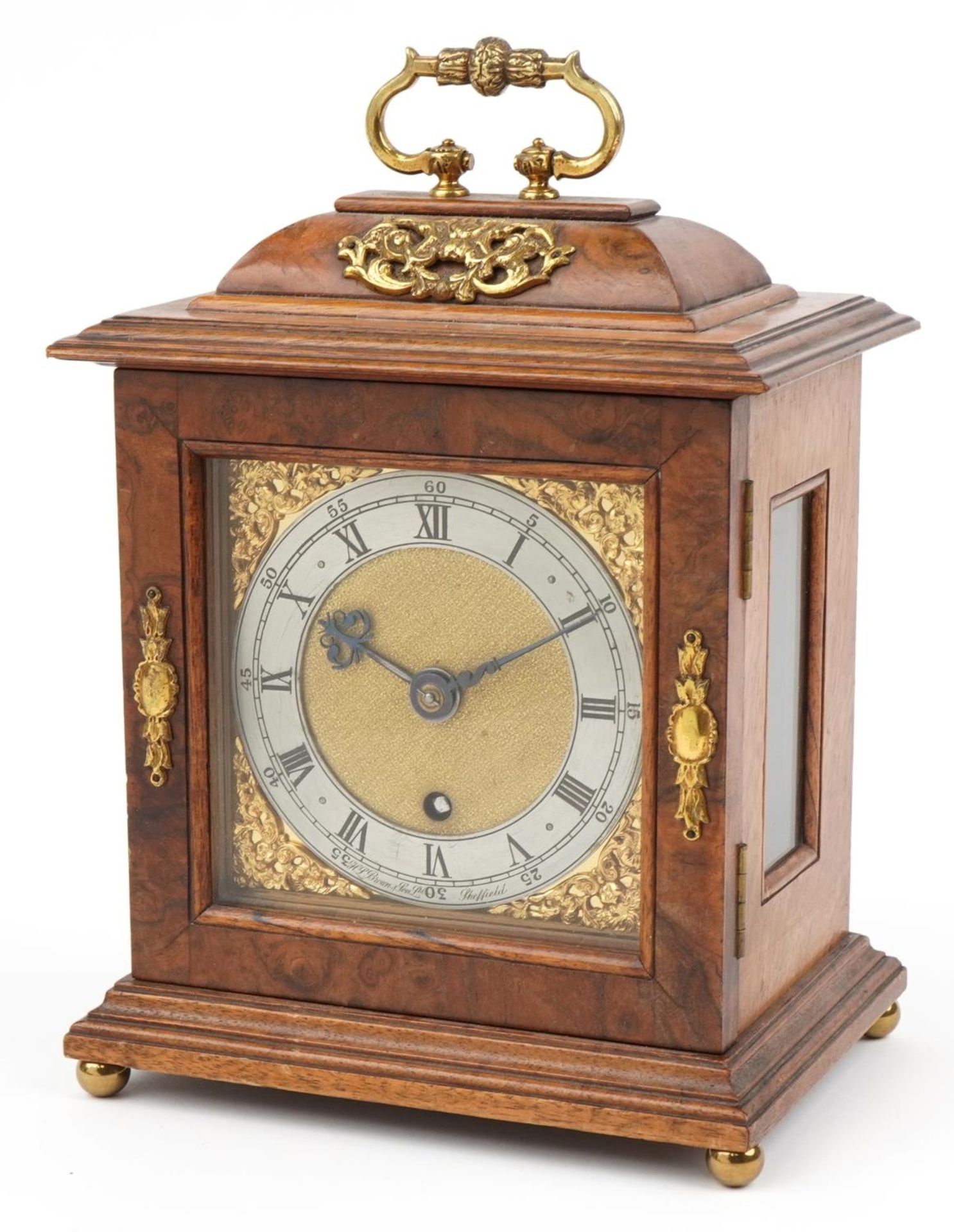 Victorian burr wood mantle clock with gilt metal mounts and silvered dial having Roman numerals