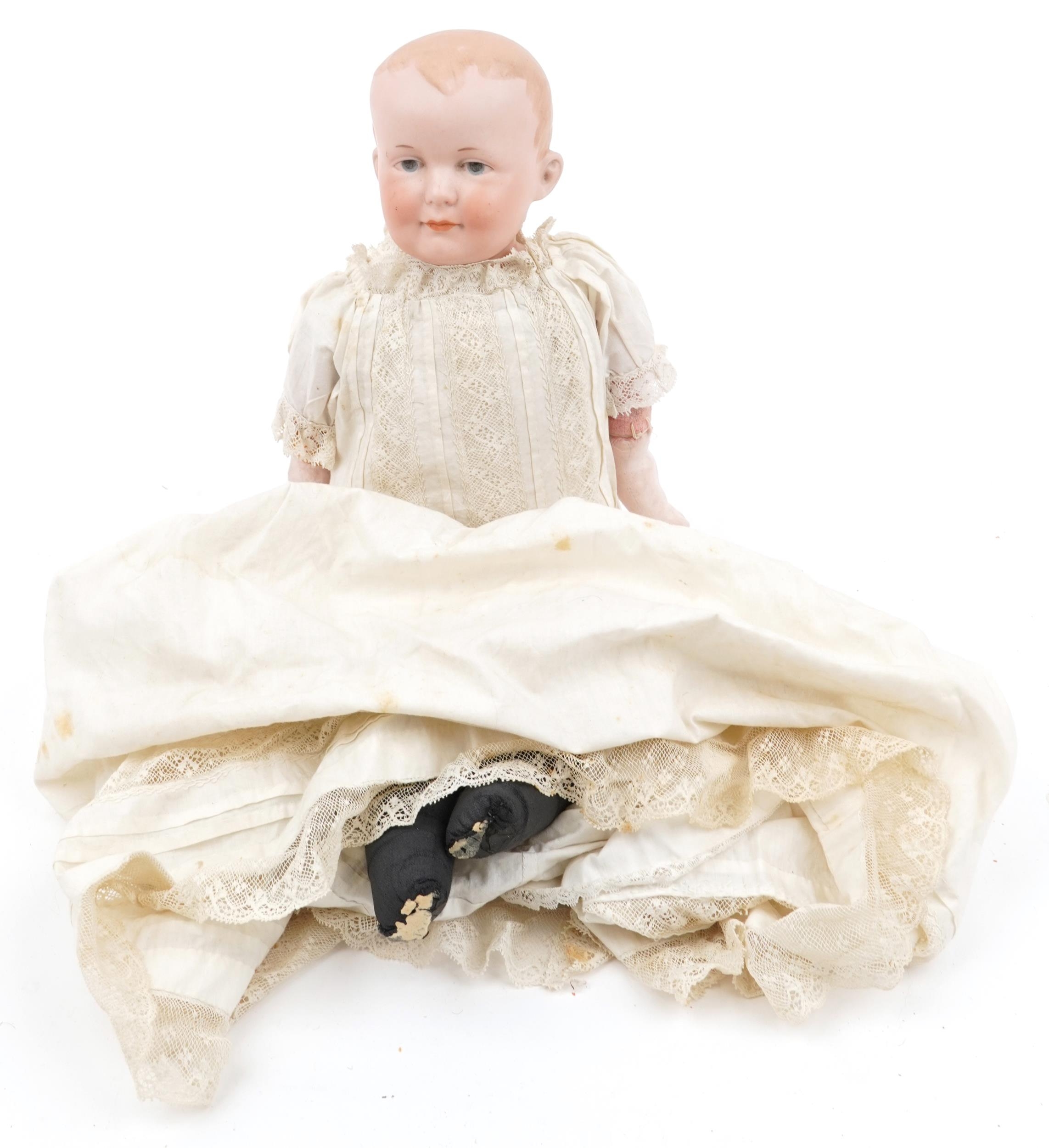 Armand Marseille, antique German bisque headed baby doll in a christening gown impressed 600A2M D.