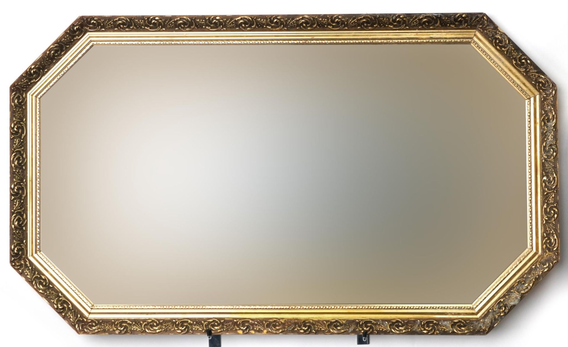 Large gilt framed octagonal wall hanging mirror with bevelled glass, 105cm x 61cm