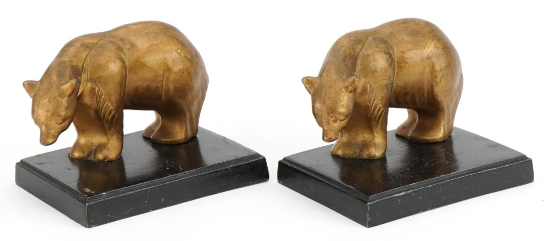 Matched pair of Art Deco cast metal bookends in the form of polar bears, each 13cm wide