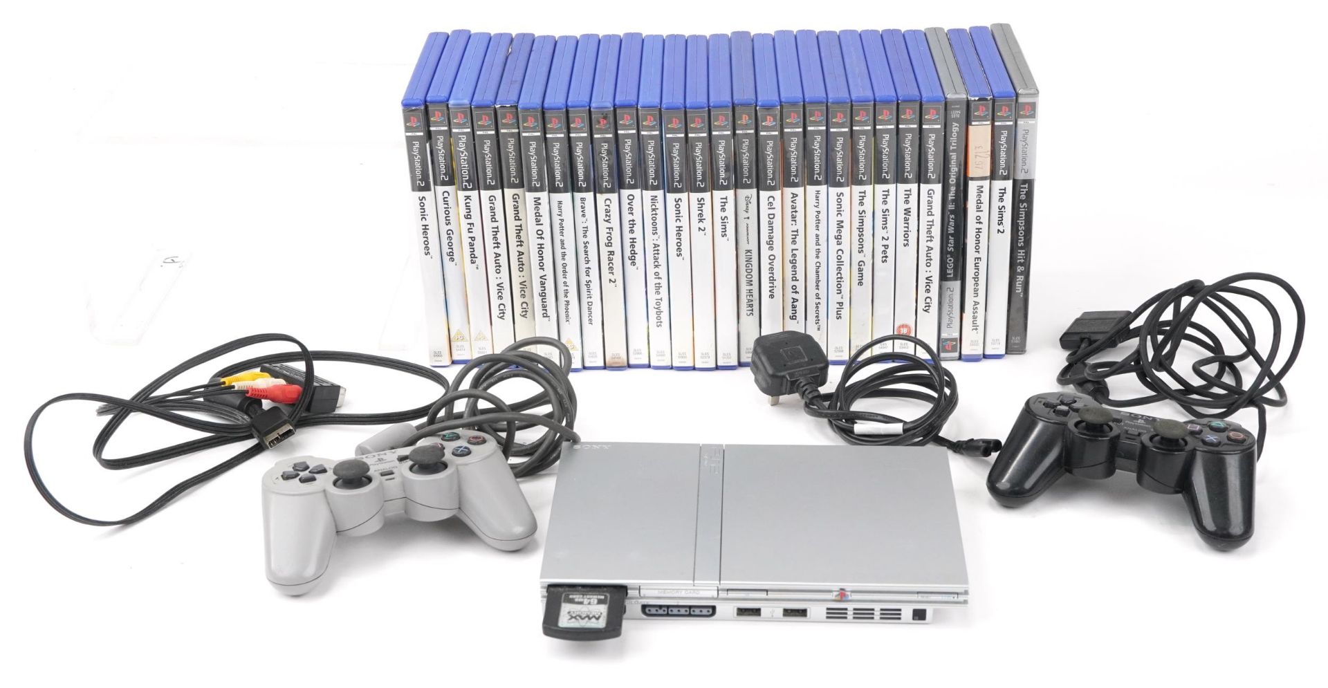 Sony PlayStation 2 games console with controllers and a collection of games